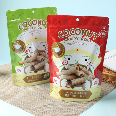 Feitos sob encomenda impressos levantam-se o malote com o zíper para doces. Cookies, biscoitos. Empacotamento do café